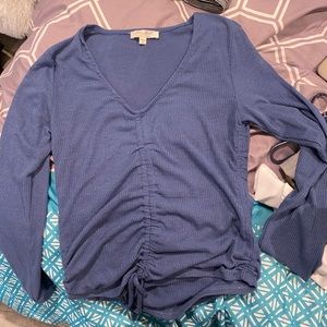 blue tie up long sleeve shirt
